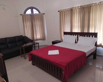 Hotel O Summerland Inn - Taliparamba - Bedroom