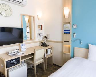Toyoko Inn Kobe Sannomiya eki Shiyakusho Mae - Kobe - Bedroom