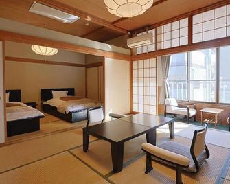 Hotel Kameya Honten - Chikuma - Κρεβατοκάμαρα