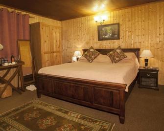 Nedous Hotel - Gulmarg - Bedroom