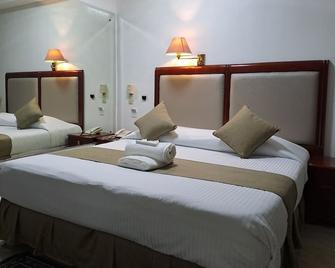 Wild Orchid Resort - אנג'לס סיטי - חדר שינה