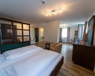 Hotel Restaurant Auerhahn - Bad Wildbad - Schlafzimmer
