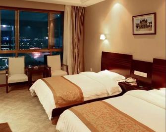 Huangshan Guangjiao Hotel - הואנגשאן - חדר שינה