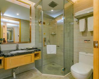 Yiyuan Times Hotel (Qiandong West Station Branch) - Shaoyang - Habitación