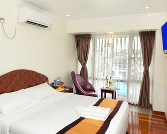 Hotel Bond - יאנגון - חדר שינה