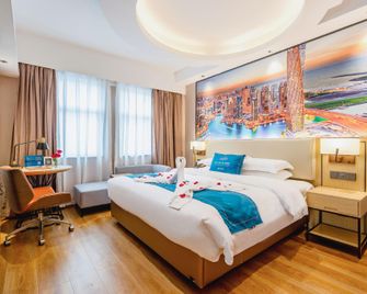Dongshan xi da wei Hotel (Nanmenwan Branch) - Zhangzhou - Bedroom