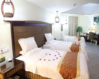 Serengeti Hotel - Haikou - Habitación