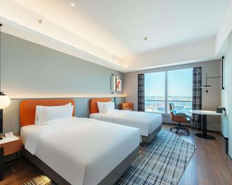 Novotel Dalian Zhongshan Square - Dalian - Habitación