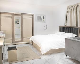 Comfortable & Big Family Apartments 10Mins Drive to Al-Masjid -Nabawi - Nozol Noor 2 - Medina - Bedroom