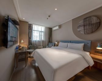 Home Inn Neo Zhenjiang Railway Station Zhongshan Bridge Rt-Mart - Zhenjiang - Camera da letto