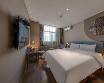 Home Inn Neo Zhenjiang Railway Station Zhongshan Bridge Rt-Mart - Zhenjiang - Camera da letto