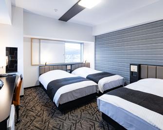 Apa Hotel & Resort Sapporo - Sapporo - Bedroom