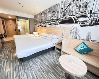 City Express Hotel (Guangning City Center Square Branch) - Zhaoqing - Bedroom