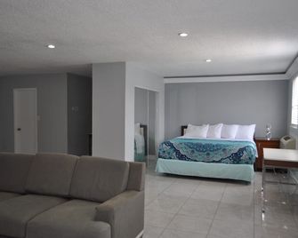 Apm Inn & Suites - Jacksonville - ג'קסונוויל - חדר שינה