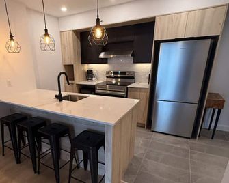 Stylish 1-Bedroom Apartment in Quebec| Prisme - Québec City - Kitchen