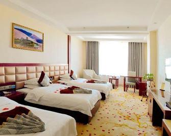 Jinrun Hotel - Jiuquan - Schlafzimmer