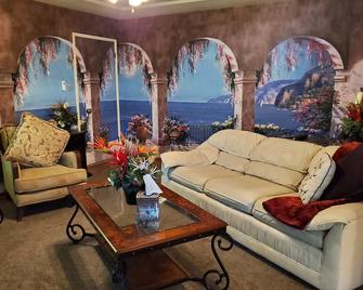 This Mediterranean design will transport you into a beautiful experience! - Bakersfield - Living room