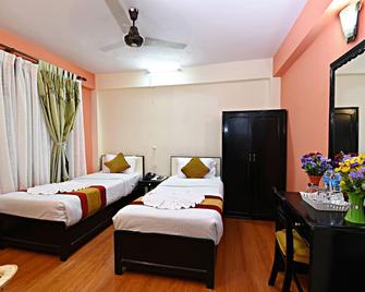 Hotel Pleasure Home - קטמאנדו - חדר שינה