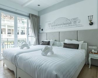 White Ivory Bed & Breakfast - בנגקוק - חדר שינה