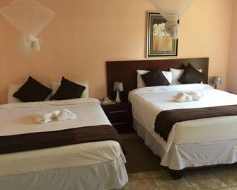 Plateau Guest House - Kasane - Bedroom