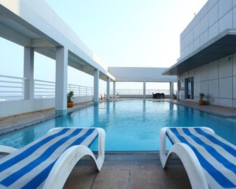 OYO 104 Q House 3 Apartments - Manama - Pool