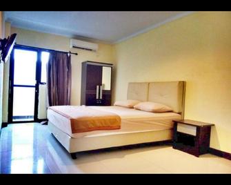 Quint Hotel - Manado - Bedroom