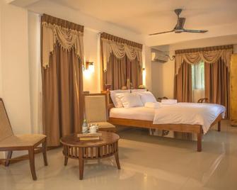 Tropical Biosphere Hotel - Kamadhoo - Habitación