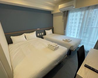 Hotel Living Inn Kenchoumaeeki - Naha - Bedroom