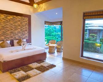 The Roar Resort - Rāmnagar - Habitación