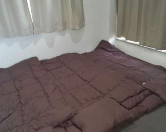 سيمبل ستاي مياجيما – هوستل - هاتسوكايتشي - غرفة نوم