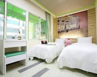 Clover House Hotel - Taoyuan City - חדר שינה