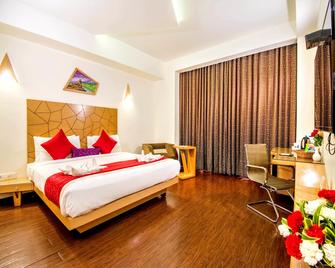 Rockdale Clarks Inn Suites - Visakhapatnam - Bedroom