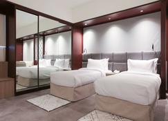 Sitara Hotel Apartment - Dubaj - Ložnice