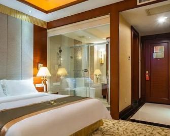 Yijian Holiday Hotel - Zhuhai - Bedroom