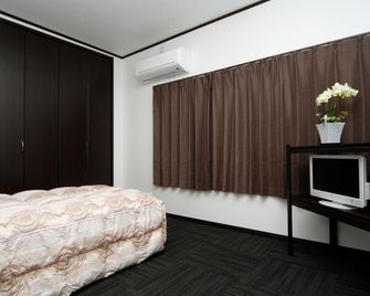 Hotel Marumiya - Taketoyo - Schlafzimmer