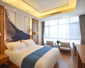 Yizhidao Hotel (Qingdao Hongdao High-tech Zone Fantawild) - Qingdao - Bedroom