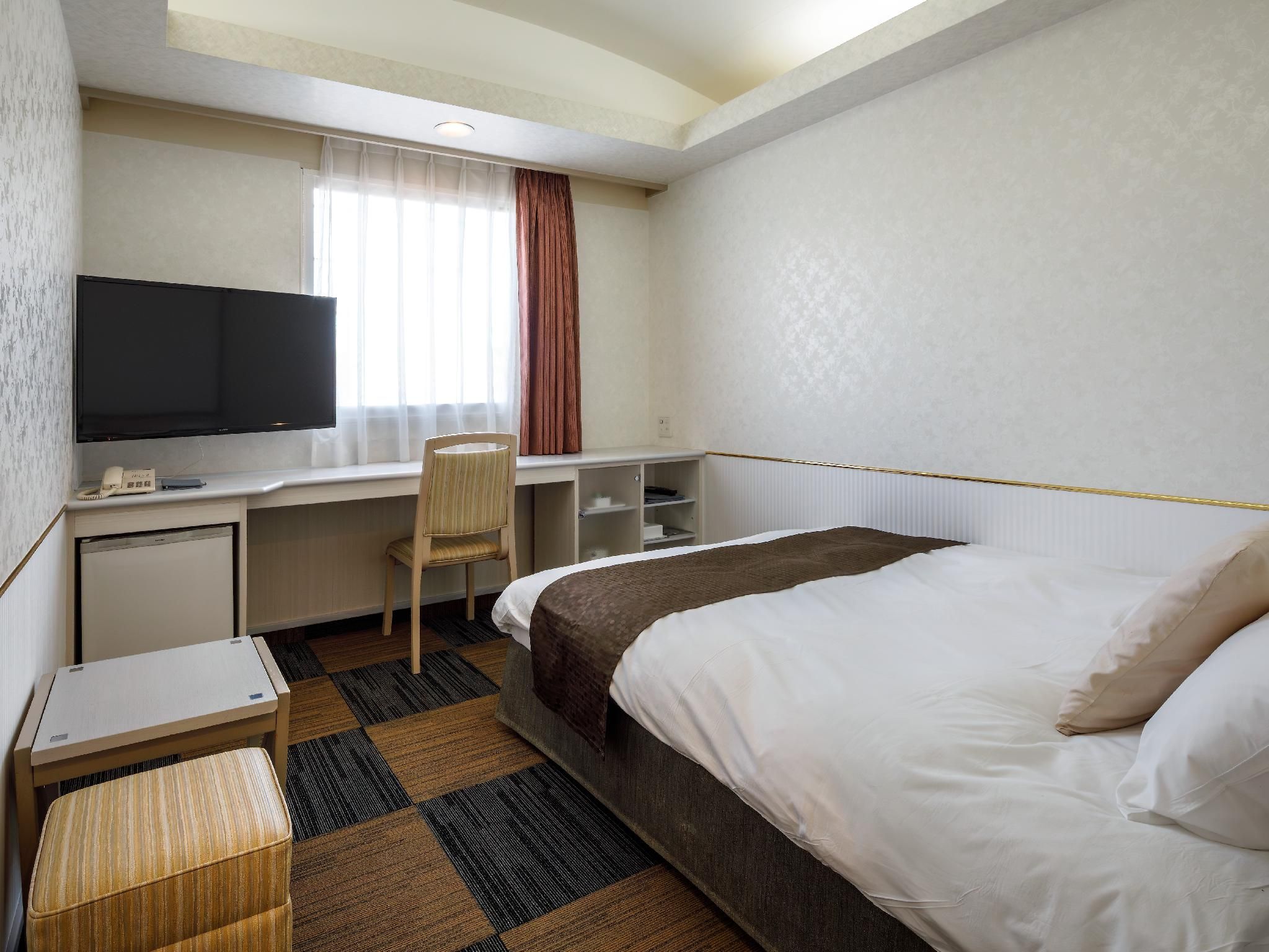 Hotel Diasmont Niigata - نيجاتا - غرفة نوم