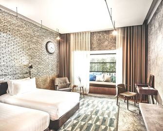 The Restro Hotel - הוא הין - חדר שינה