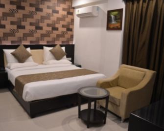 The City Grand Hotel - Gwalior - Habitación