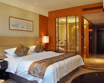 Happiness Hotel - تشانغتشو - غرفة نوم