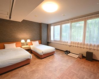 Ooedo onsen monogatari wanwan resort Shinshu Ueda - Ueda - Schlafzimmer