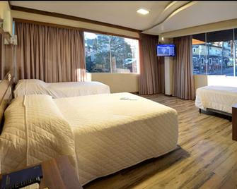 سكاي سنترو هوتل آند سبا - غرامادو - غرفة نوم