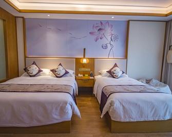 Jiuhuashan Rongxi Manor Hot Spring Hotel - Chizhou - Habitación