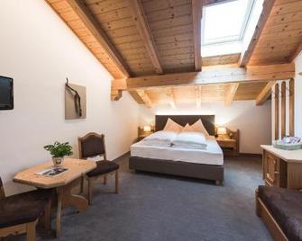 Hotel Alpenhof - טירולו - חדר שינה