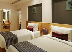 Melange Luxury Serviced Apartments - Bengaluru - Schlafzimmer