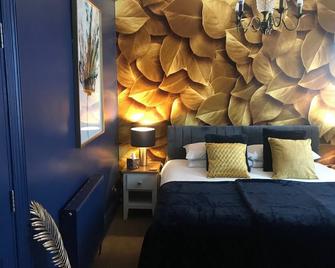 Amarillo Guesthouse - בורנמאות' - חדר שינה