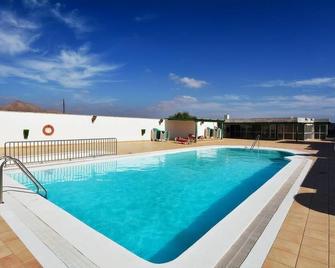 Relax Tiñosa ist eine schöne Wohnung in einer sehr ruhigen und sehr gepflegten Anlage mit Gemeinschaftspool in Puerto del Carmen - Los Pocillos - Pool