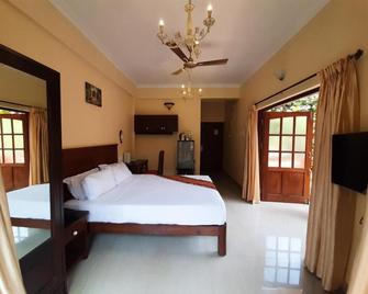 Resort Palmeiras Dourado - Cansaulim - Schlafzimmer