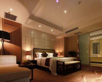 Sanyuan Hotel - Nanyang - Schlafzimmer