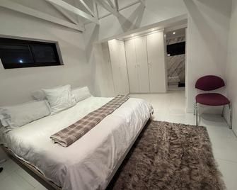 The White House - Zonnebloem - Kapstadt - Schlafzimmer
